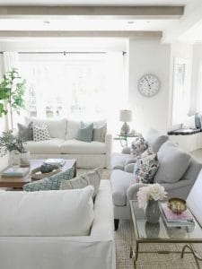 white couch, neutral living room, open concept, classic gray, living room beams
