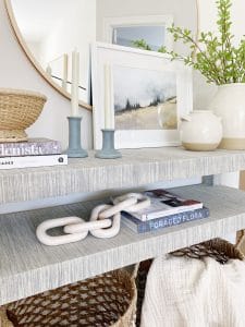 Console and entryway table styling, sharing my favorite Serena & Lily Blake console table styled with a round mirror, pretty decor finds, faux greenery, and functional storage. Simply styling help create a beautiful and welcoming entryway.