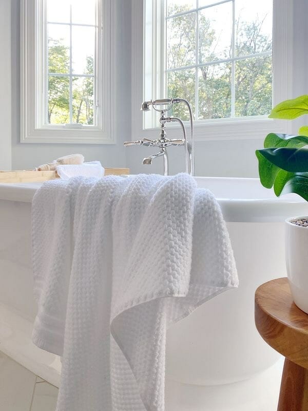 Gap Home bath towels, freestanding bath tub