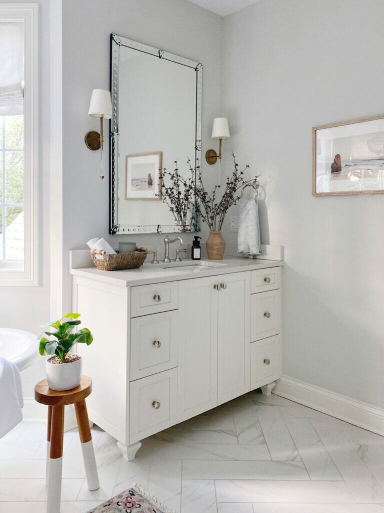 White cabinets, vanity mirror, and brass sconces | A Luxury Spa Retreat with Affordable Finds from Walmart