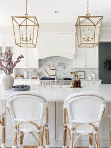 white kitchen features serena & lily riviera counter stools