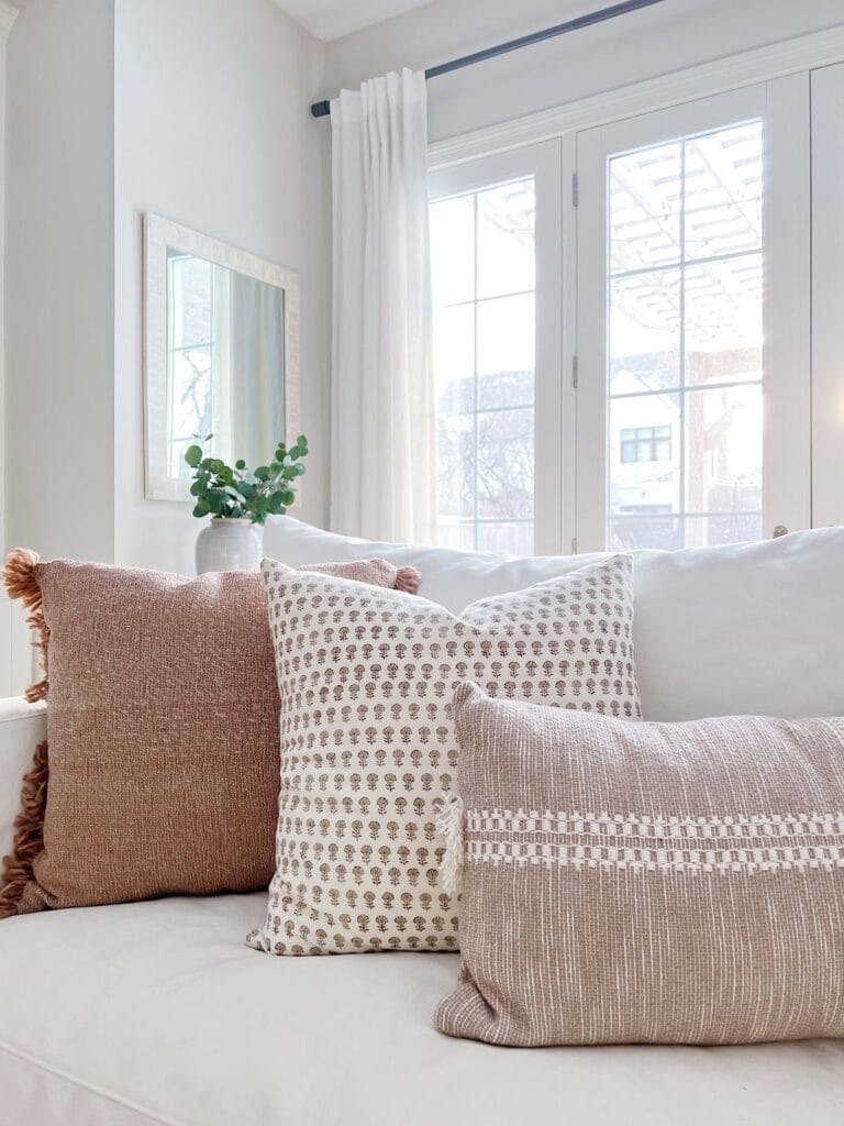 couch with pillow combination in mauve