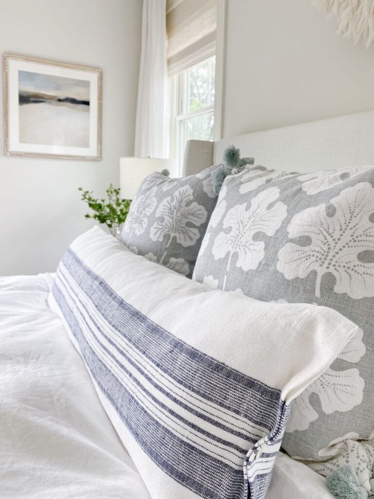 bed pillows in gray and blue tones