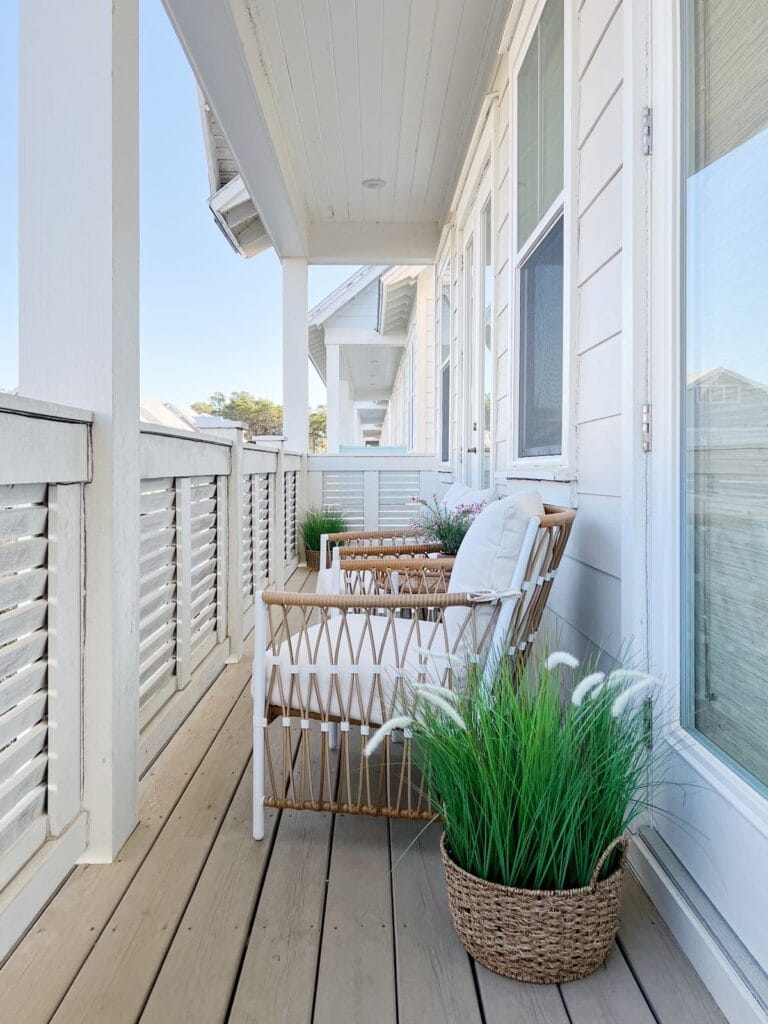 porch with chair and basket of ornamental grass | Outdoor Spring Decorations